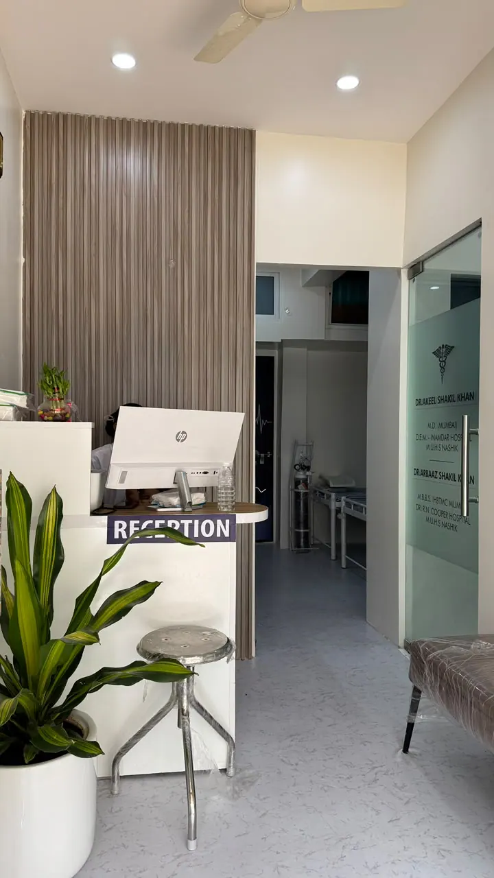 Reception counter and entrance inside Elitecare Multispeciality Hospital